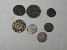A small collection of early Coinage, two copper Roman Coins, possibly Constantine, a Silver Edward I