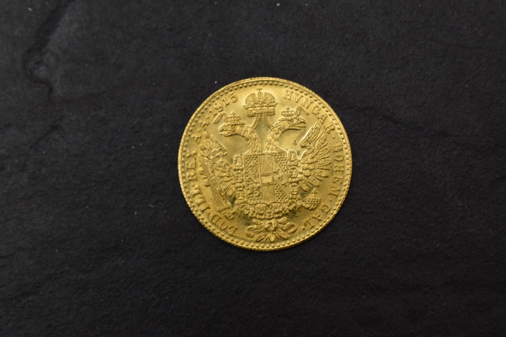An Austrian 1915 Gold One Ducat Coin, restike, possible proofs, weight 3.5g