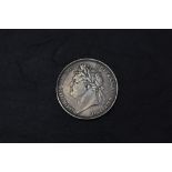 A 1821 George III Silver Secundo Crown