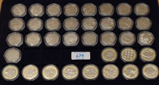 A tray containing 25 modern 50p Coins, 2018 onwards including Christopher Robin, Pigket, Team GB,