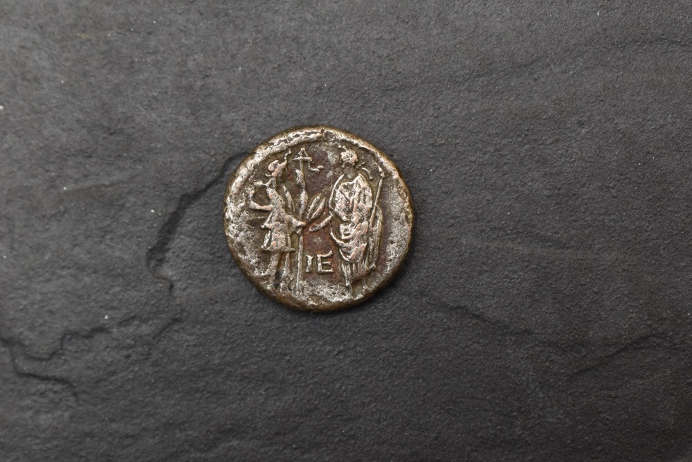 A Roman Silver Coin possibly Hadrian, head & shoulder portrait on obverse, two figures on reverse,