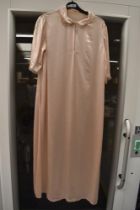 A vintage blush ivory coloured glossy satin nightdress.