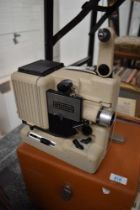 A vintage Eumig P8 projector with case.