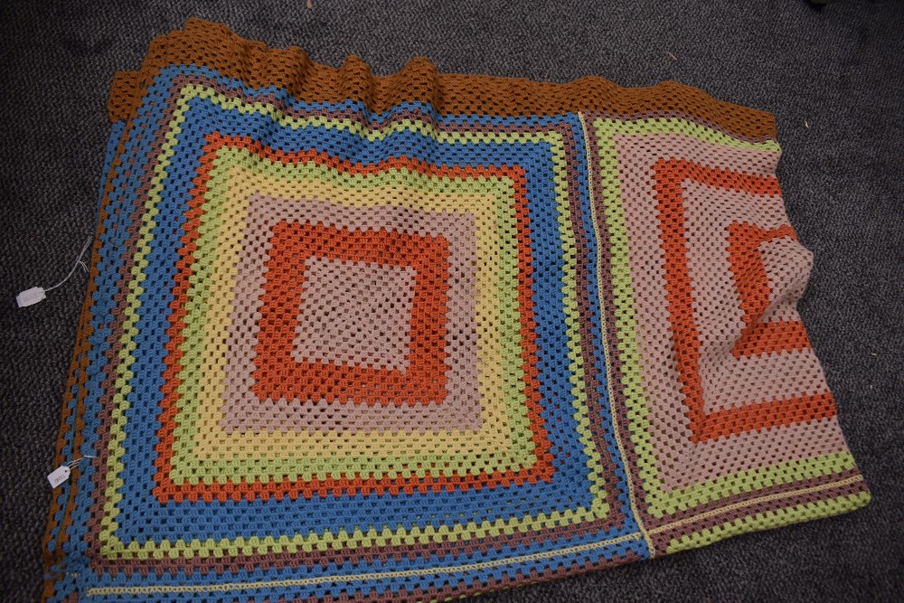 A large bright and cheerful vintage crocheted blanket, AF, some wear.