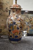 A large Oriental style table lamp AF (large chip to top collar at the back).
