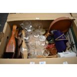 A leather travel case with a selection of items including mens cufflinks, shirt buttons, cigarette