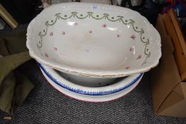 Four large wash bowls including Bisto and Empire Ware etc.