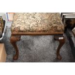 An early 20tyh century dressing table stool having Queen Anne style legs.