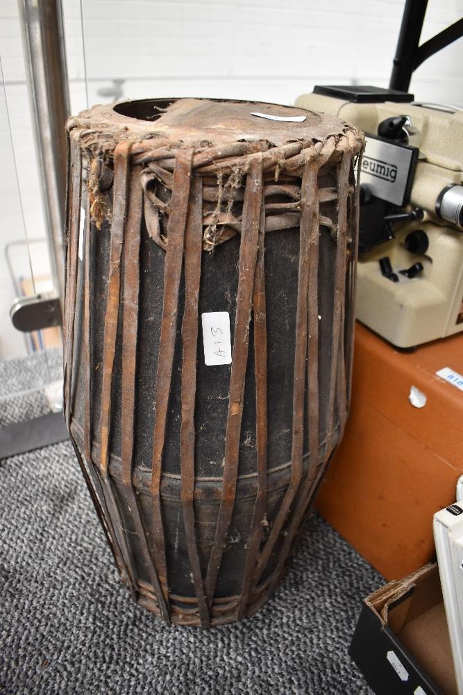 A vintage Mridangam in need of restoration.