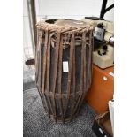 A vintage Mridangam in need of restoration.