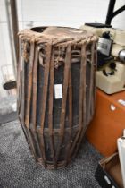 A vintage Mridangam in need of restoration.