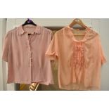 Two 1950s pink blouses, one of pink crepe with cut work and machine embroidery to collar and