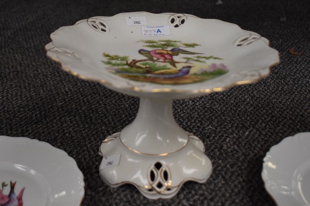 A continental porcelain comport decorated with exotic birds on cream ground, sold together with four - Image 5 of 5
