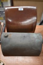 A vintage stone hot water bottle, of sloped form, for carriage or motor car foot well and a metal