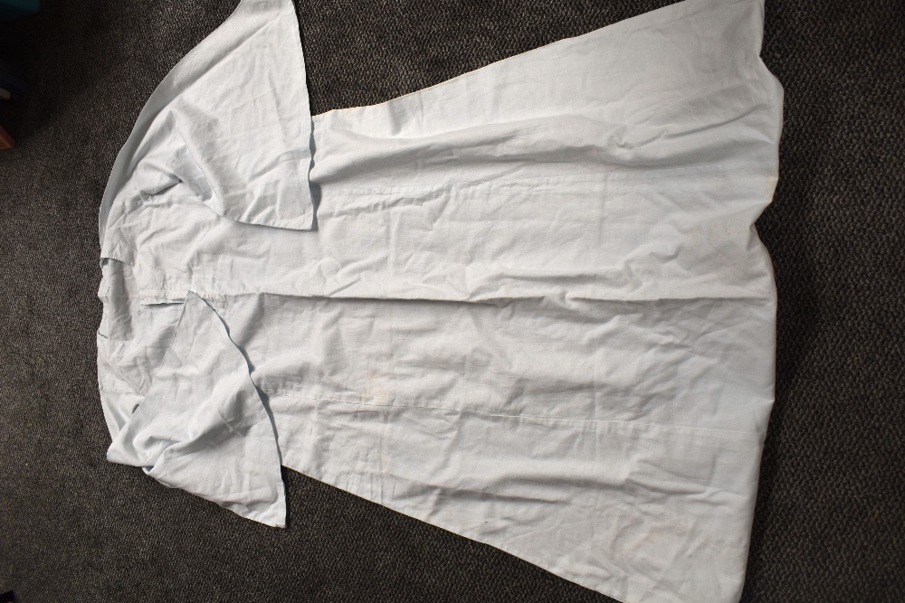 A carton of assorted clothes including mens cotton white trousers, ladies linen painting smocks, a - Image 9 of 11