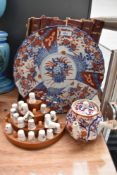 A Japanese Imari plate and similar Japanese teapot sold along with a selection of ceramic thimbles