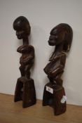 Two 19th/20th African carved loom pullets for textile making, the largest measures 30cm tall