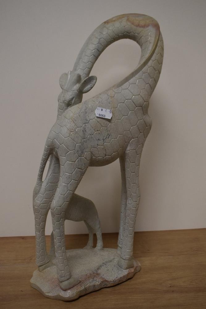 A carved African yellow granite study of a giraffe with calf. - Image 2 of 2