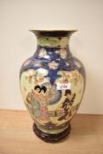 A 20th century eastern pottery baluster vase, in the Satsuma style, marked 'Satsuma' to base, on a
