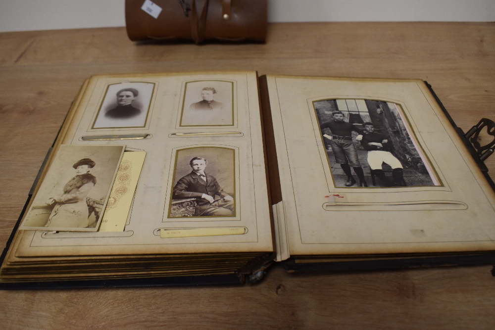 A Victorian embossed and tooled leather bound Cart de Visite album, containing various - Image 2 of 2