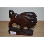 A 20th century carved bison study.