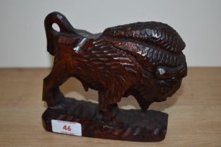 A 20th century carved bison study.