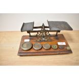 A set of Victorian postal scales and weights, measuring 23cm long