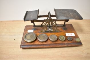 A set of Victorian postal scales and weights, measuring 23cm long