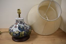 A Moorcroft Pottery 'Bramble' patterned table lamp, tube lined in the typical manner with fruiting