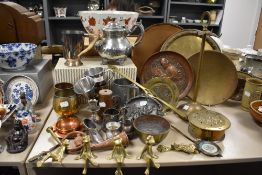 A mixed collection of brass, copper and silver plated items including four graduated shelf frogs,