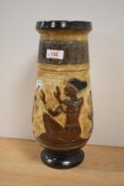 An early 20th Century studio pottery vase, by Roger Guerin (1896-1954, Belgian), glazed in brown and