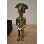 A North African cast metal statue of a male covering his genitals. 16cm high.