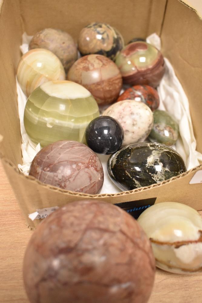 An assorted collection of polished stone decorative eggs and balls, the largest having a diameter of - Image 2 of 2