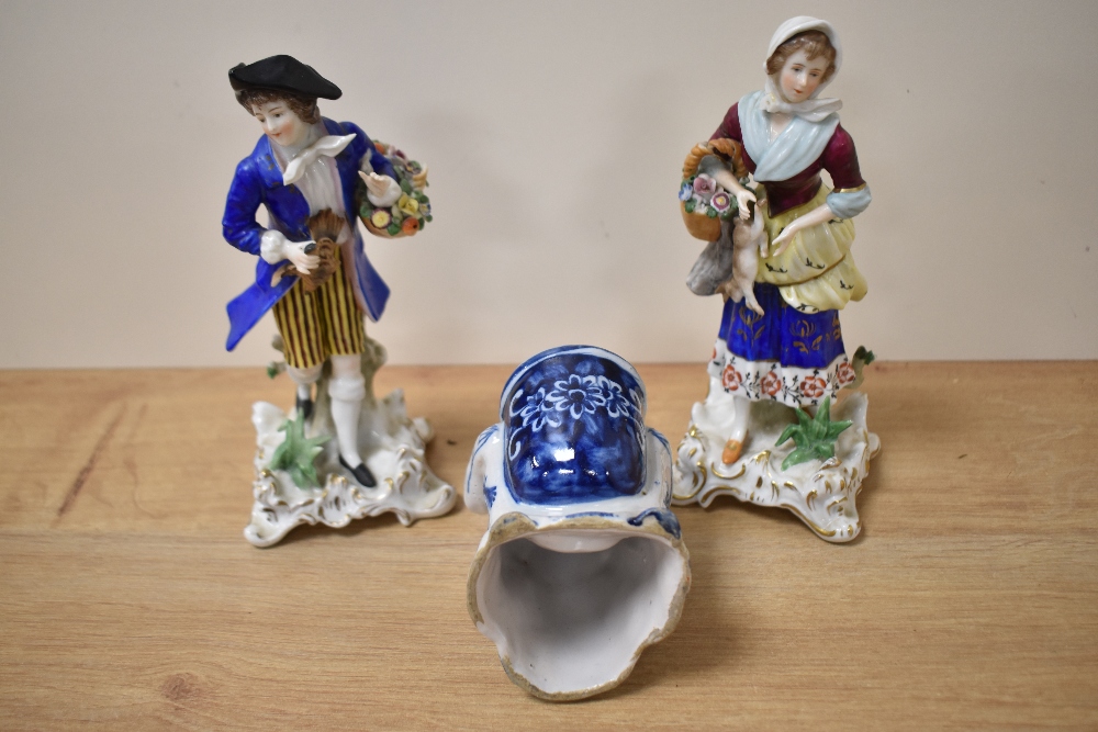 Two 19th Century Continental porcelain figural studies of street sellers, the largest measuring 20cm - Image 2 of 3