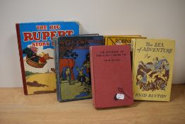 Five vintage childrens books including Robinson Crusoe, The Sea of Adventure and Alice's