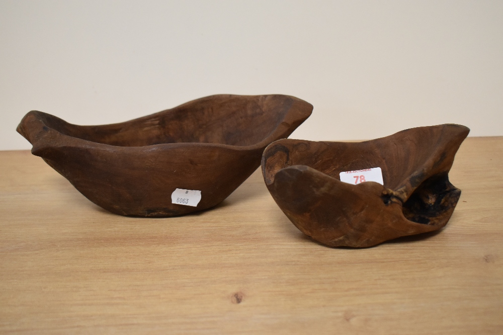 Two rustic olive wood carved bowls, the largest measures 24cm long