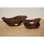 Two rustic olive wood carved bowls, the largest measures 24cm long