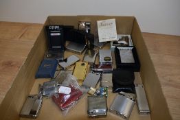 A selection of collectable cigaretter lighters, including vintage Ronson and Zippo.