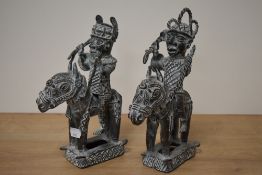 Two cast metal African studies of horsemen, each measuring 25cm tall