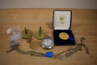 A collection of miscellaneous items including a Timex Expedition pocket watch, a silver curb link