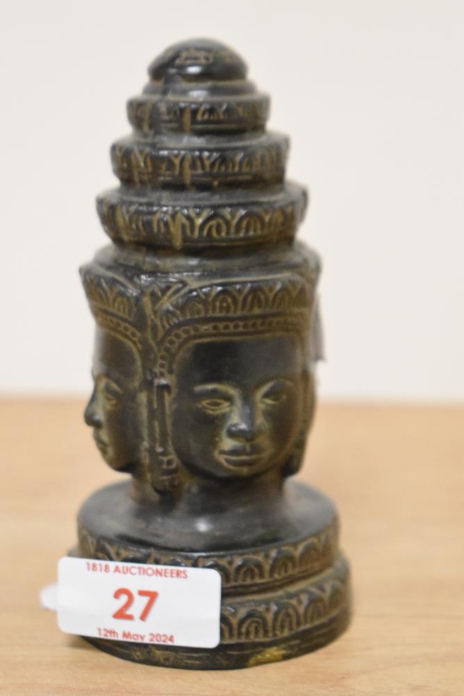 A Thai cast patinated metal depiction of the four faces of Buddha, approx 12.5cm