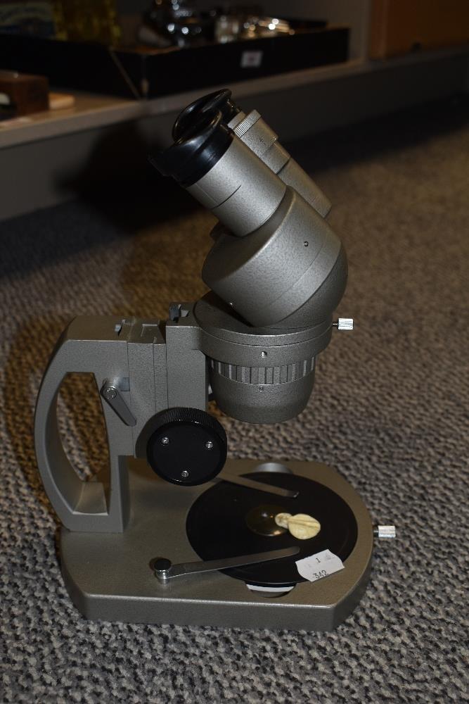 A vintage Olympus VT-11 microscope with lenses and specimen holders sold along with a watch makers - Image 2 of 2