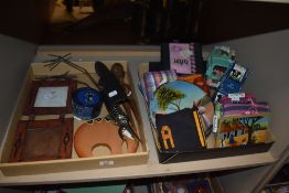 An assortment of African handicrafts including coasters, table wear, toy truck, etc.