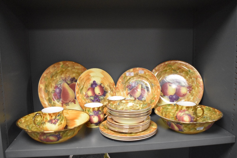 A quantity of Staffordshire porcelain tableware, in the style of Royal Worcester, decorated with a