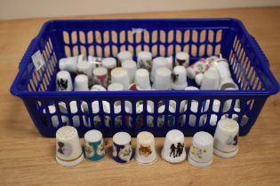 A selection of ceramic decorative thimbles (45 approx).