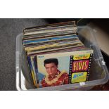 A carton of assorted LPs including Elvis Presley, The Eagles, Abba and David Essex ect.