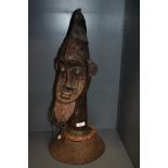 An impressive Nigerian / Benin / Yoruba cast bronze memorial head with closed eyes and stylistic