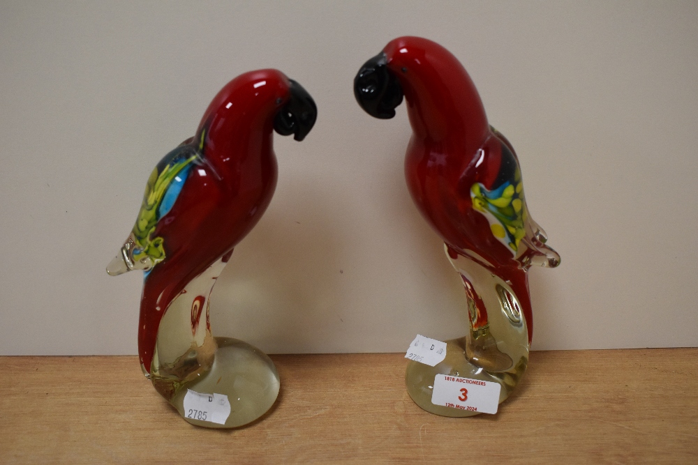 A pair of decorative art glass parrots in the manner of Murano or other Italian factories