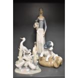 A Spanish Miguel Requena porcelain Goose Girl figurine, formed in the typical Lladro style 35.5cm