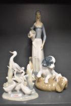 A Spanish Miguel Requena porcelain Goose Girl figurine, formed in the typical Lladro style 35.5cm
